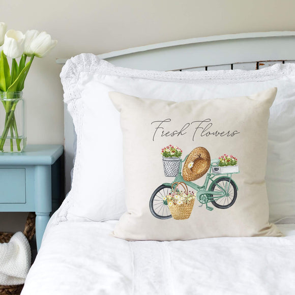 Fresh Flowers Bike Decorative Pillow Cover for Spring displayed on bed