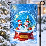 Personalized PALMER snow globe garden flag on a black metal stand in a snowy winter garden; stand not included