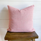 Candy Cane Striped Pillow Cover 18 by 18 inches displayed on stool 
