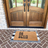 Modern farmhouse rug under welcome mat on front porch