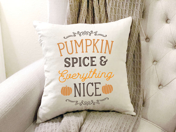 Pumpkin spice pillow cover displayed on chair 18 by 18 inches